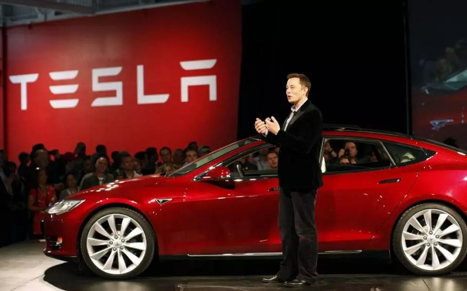 Tesla showroom concept in India, featuring a modern electric vehicle display in a premium commercial location.